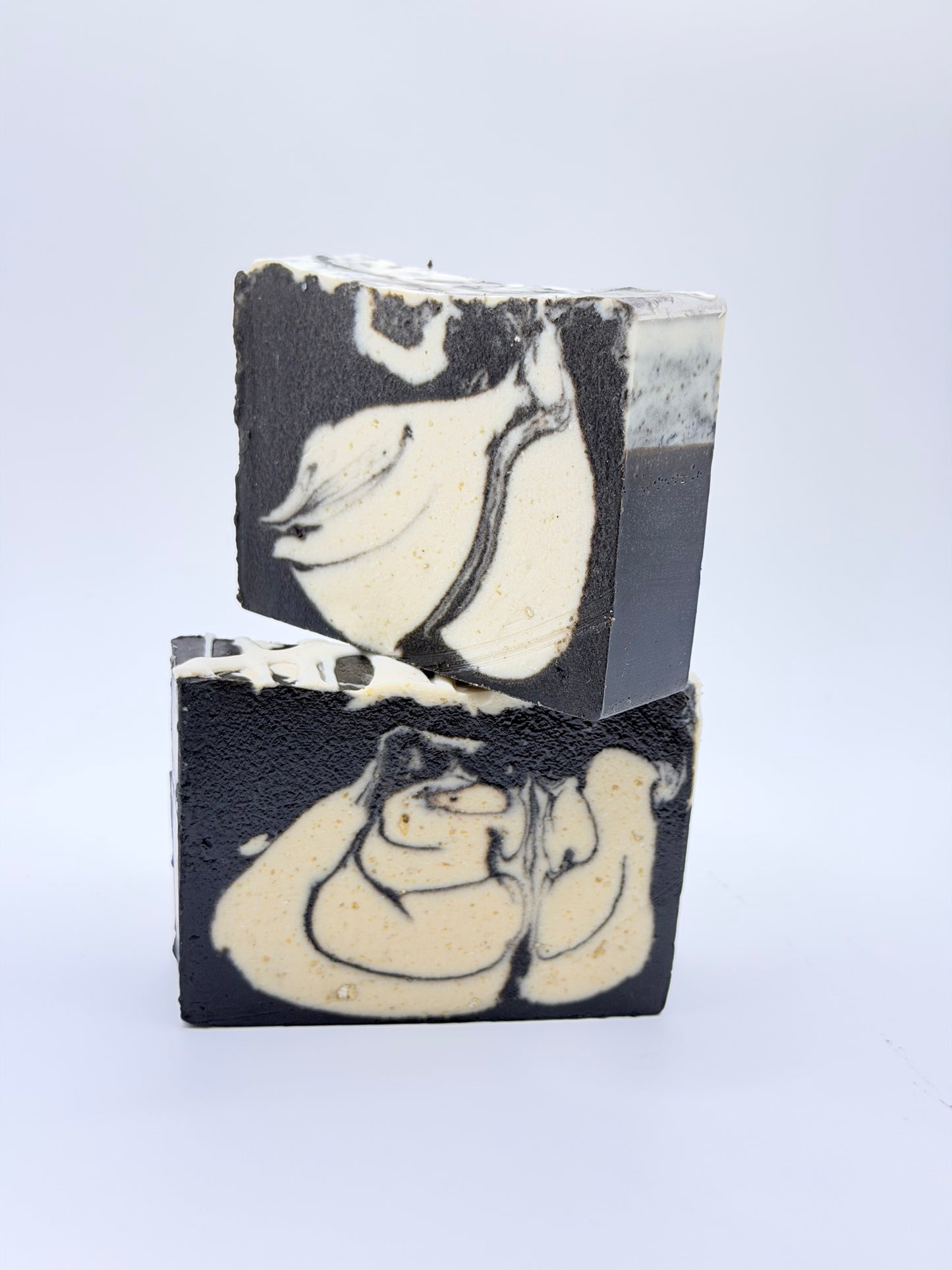 Lovebyemma JOY Gentle Exfoliate soap bar with natural ingredients, showcasing a smooth, handcrafted soap with exfoliating texture.