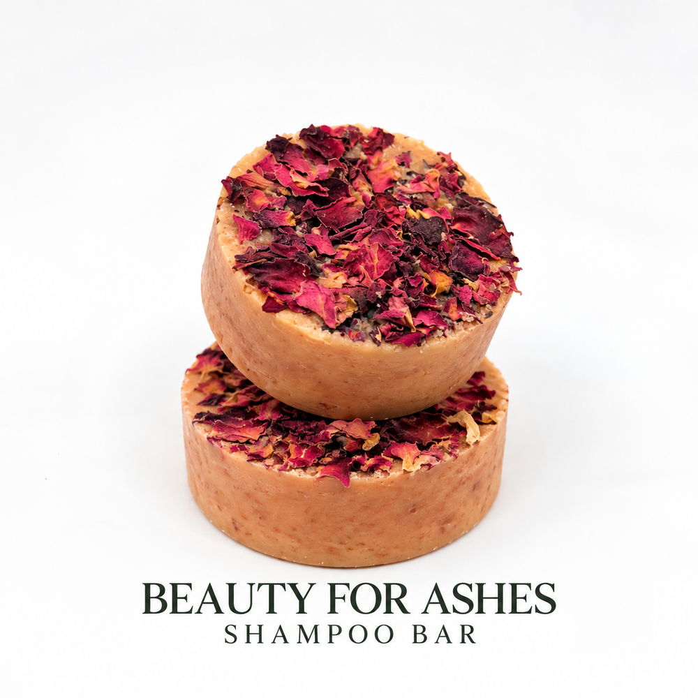 Beauty for Ashes Shampoo Bar by LOVEBYEMMASKINCARE, natural soap bar with a dark color and smooth surface for healthy hair.