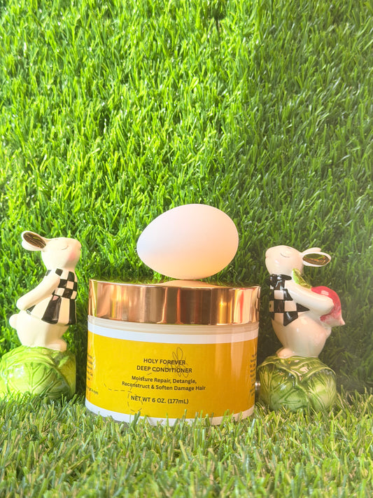 LOVEBYEMMASKINCARE Holy Forever Deep Conditioner jar, 8oz, with creamy texture, designed to repair and nourish damaged hair.