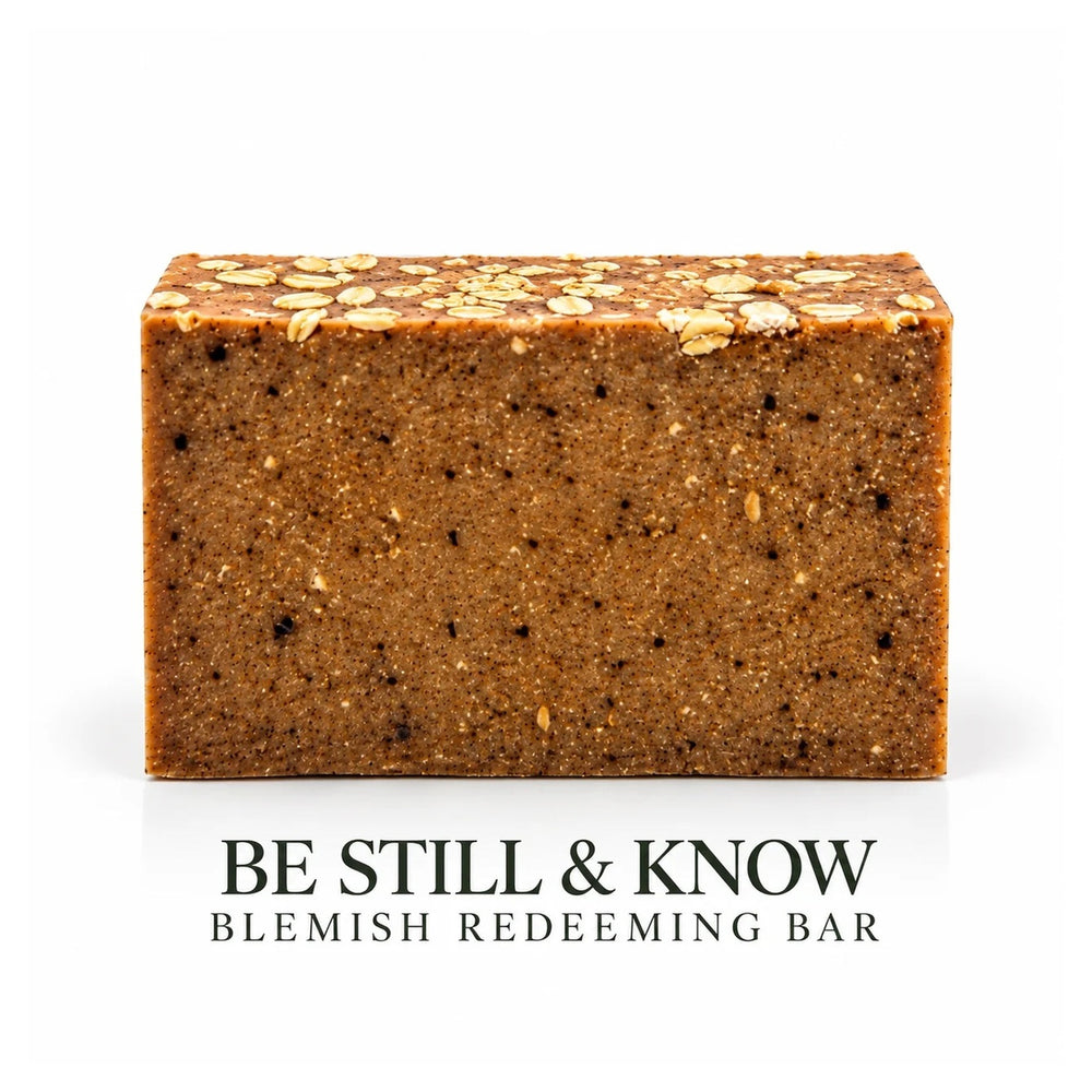 Lovebyemmaskincare Be Still & Know Blemish Redeeming Soap Bar with natural ingredients, shown in a close-up image.