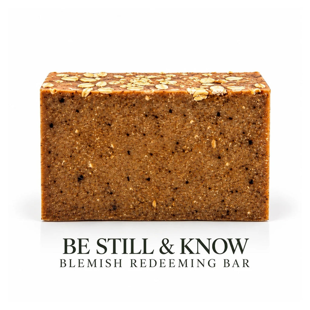 Lovebyemmaskincare Be Still & Know Blemish Redeeming Soap Bar with natural ingredients, shown in a close-up image.
