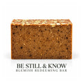 Lovebyemmaskincare Be Still & Know Blemish Redeeming Soap Bar with natural ingredients, shown in a close-up image.