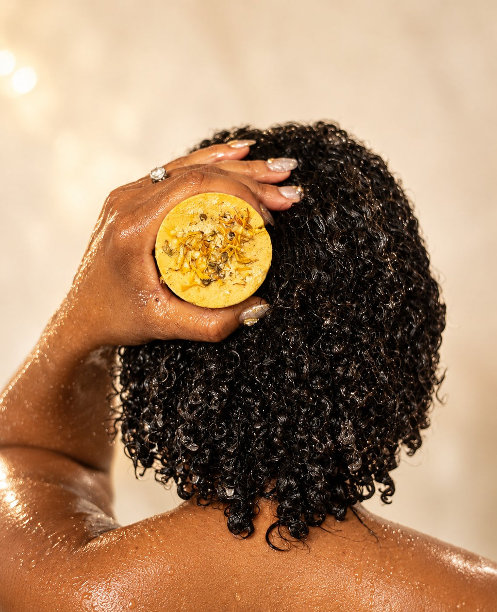 LOVEBYEMMASKINCARE Holy Forever Shampoo Bar being used, showcasing a natural solid shampoo bar for hair cleansing.