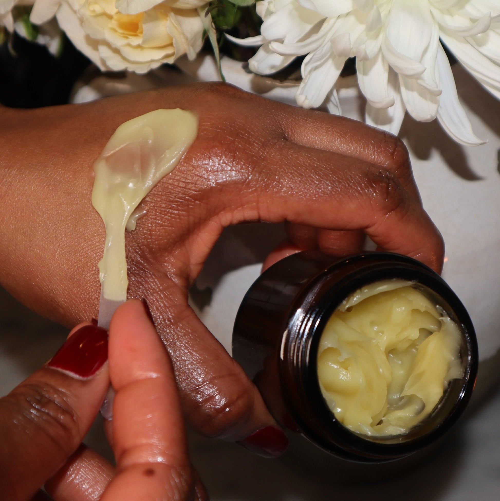 Nourishing balm for face, neck, and hands in a 2oz jar by My Store, with a rich, anti-aging cream texture visible in the image.